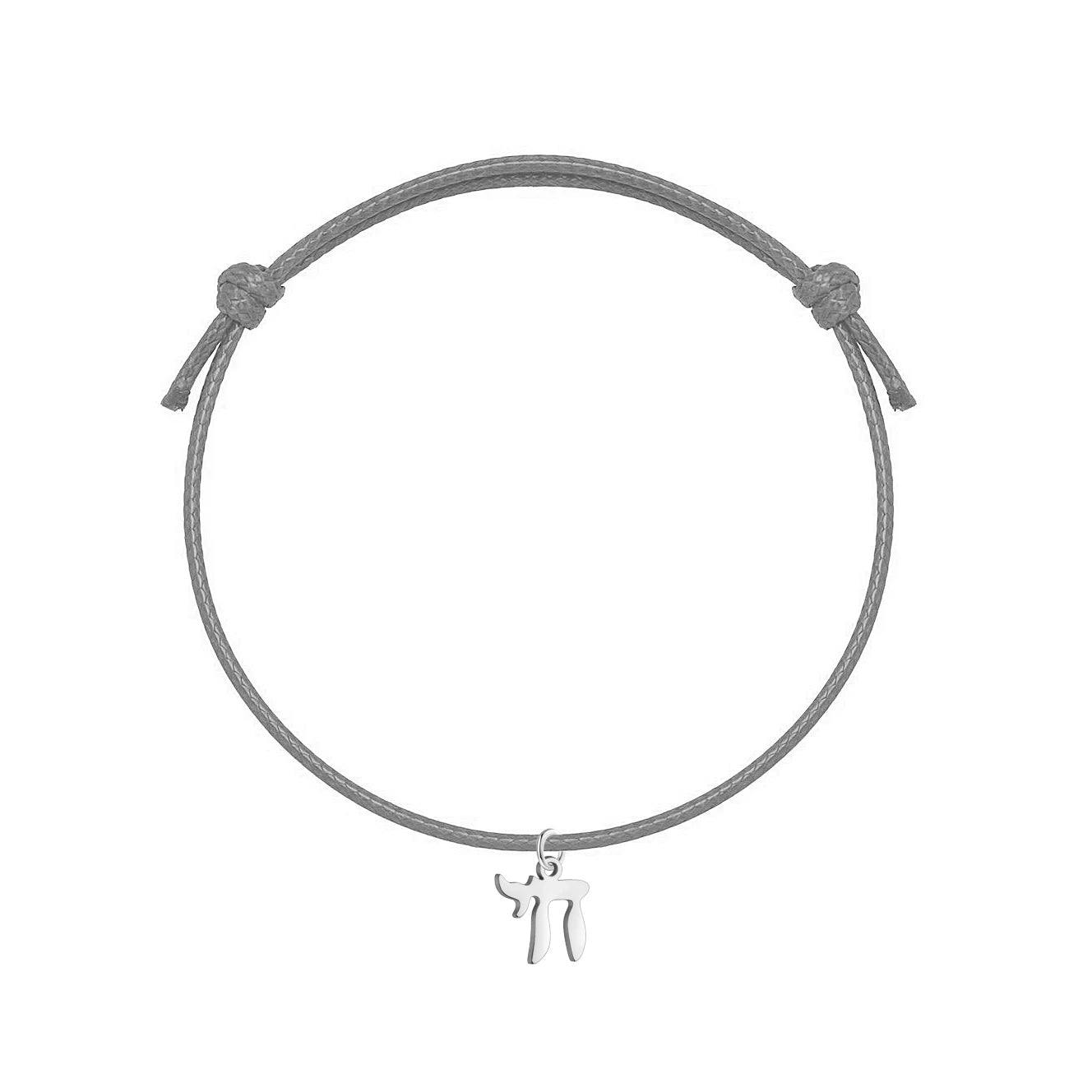 Bracelet orné du symbole Haï en acier inoxydable, monté sur bracelet artisanal ajustable. Un accsesoir qui parle, simple et unique.